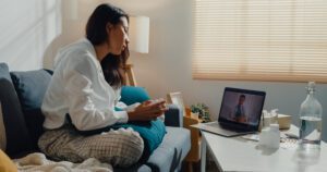 A patient and doctor having a virtual consultation via video call